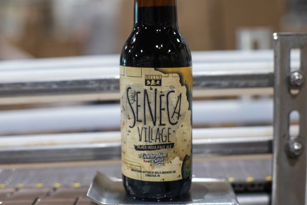 A bottle of Seneca Village on the Bottling Line just after being packaged.