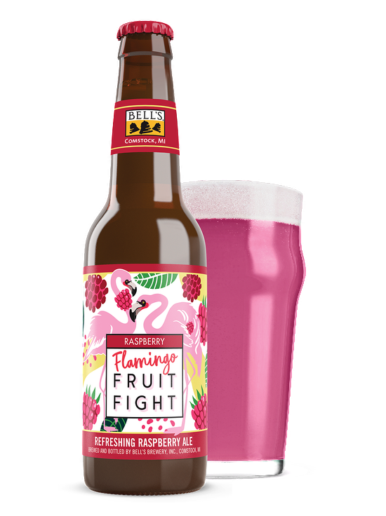 A bottle of Raspberry Flamingo Fruit Fight sitting in front of a full Nonic glass
