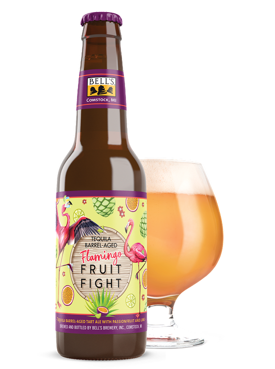 Flamingo Fruit Fight sitting in front of a full snifter glass