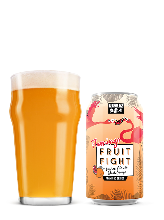 A glass of beer next to a can of Flamingo Fruit Fight Blood Orange.