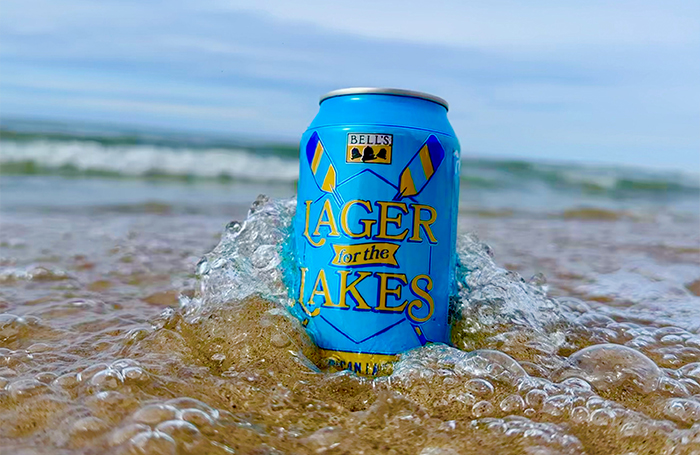 A can of Lager for the Lakes on the Lake Michigan beach