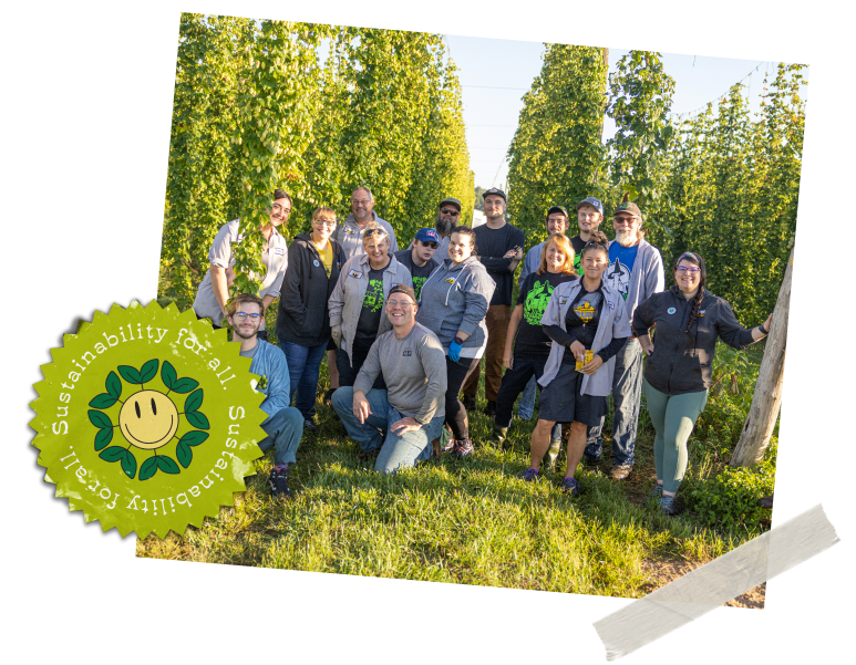 A group photo-op in the hops orchard