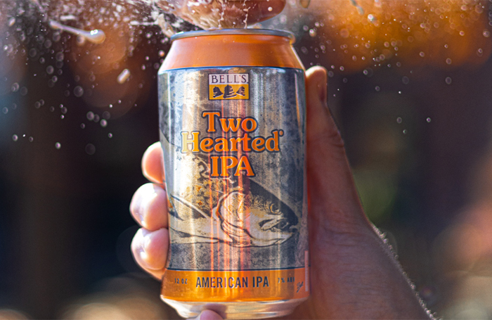 A can of Two Hearted being opened and beer spraying