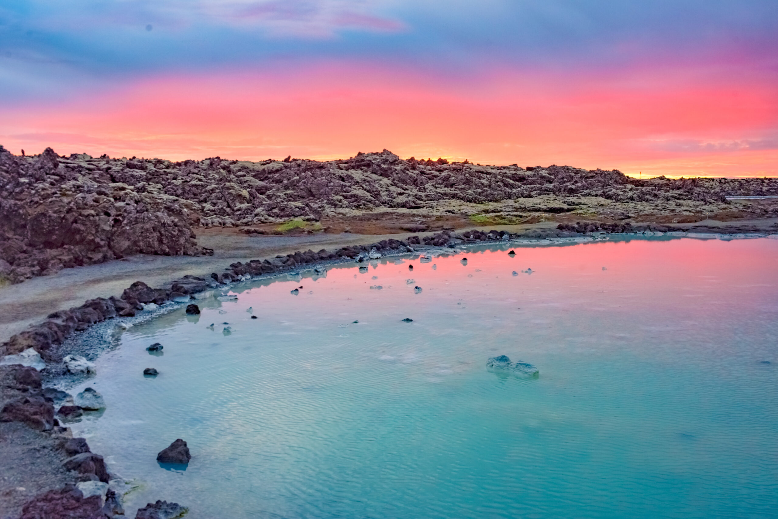 Midnight Sun Over The Blue Lagoon Geothermal Spa, Near Grindavik,