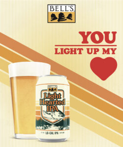 The Bell's logo is at the top of an image featuring a can and glass of Light Hearted IPA with the phrase "YOU LIGHT UP MY" Heart emoji