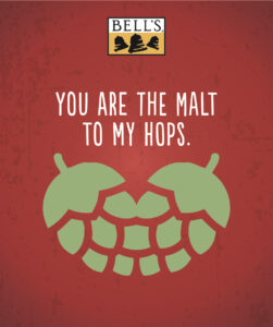 The phrase "YOU ARE THE MALT TO MY HOPS" with a graphical representation of hop cones forming a heart on a red background.