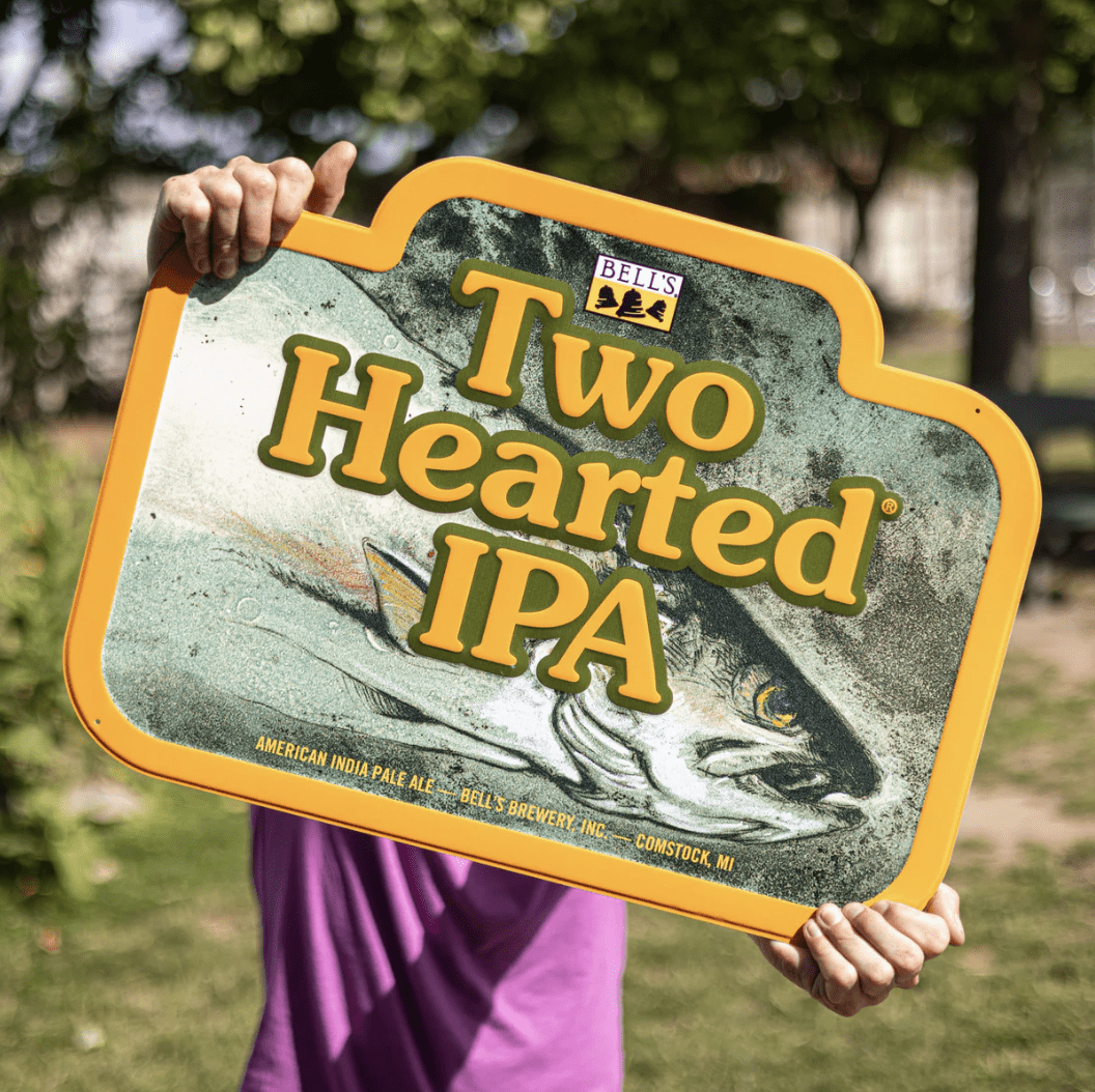 Teal full zip hoodie with the oberon logo on the back.